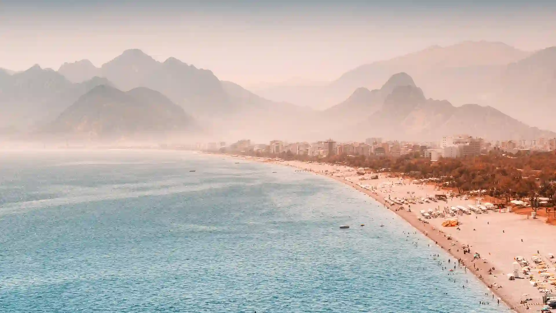 Relax and enjoy the sun at Konyaaltı Beach, one of Antalya's most popular beaches.