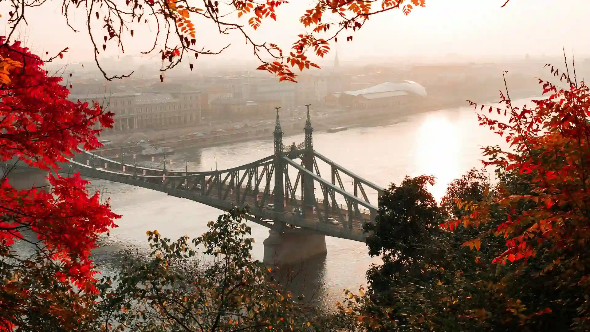 The Chain Bridge is the first permanent bridge to span the Danube River in Budapest. Opened in 1849, it is an architectural marvel and a symbol of the city's unification. Walking across the bridge offers breathtaking views of the river and the cityscape. The bridge is beautifully lit at night, making it a romantic experience.