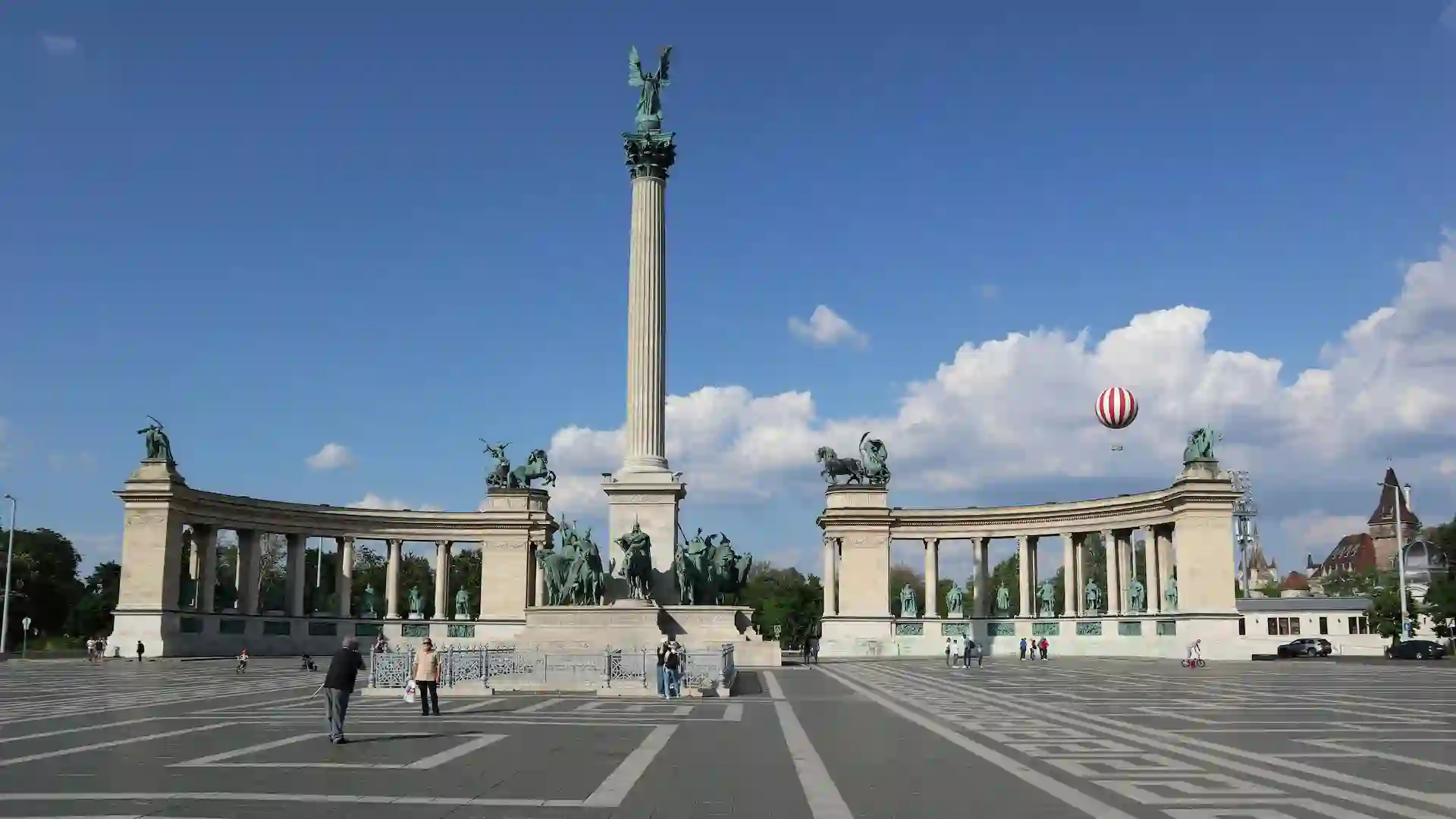 Heroes' Square is one of Budapest's most iconic public spaces, located at the end of Andrássy Avenue. The square features the Millennium Monument, with statues of Hungary's historical leaders and the Archangel Gabriel. Flanked by the Museum of Fine Arts and the Hall of Art, it’s a cultural and historical hub. It's a popular spot for tourists and locals alike.