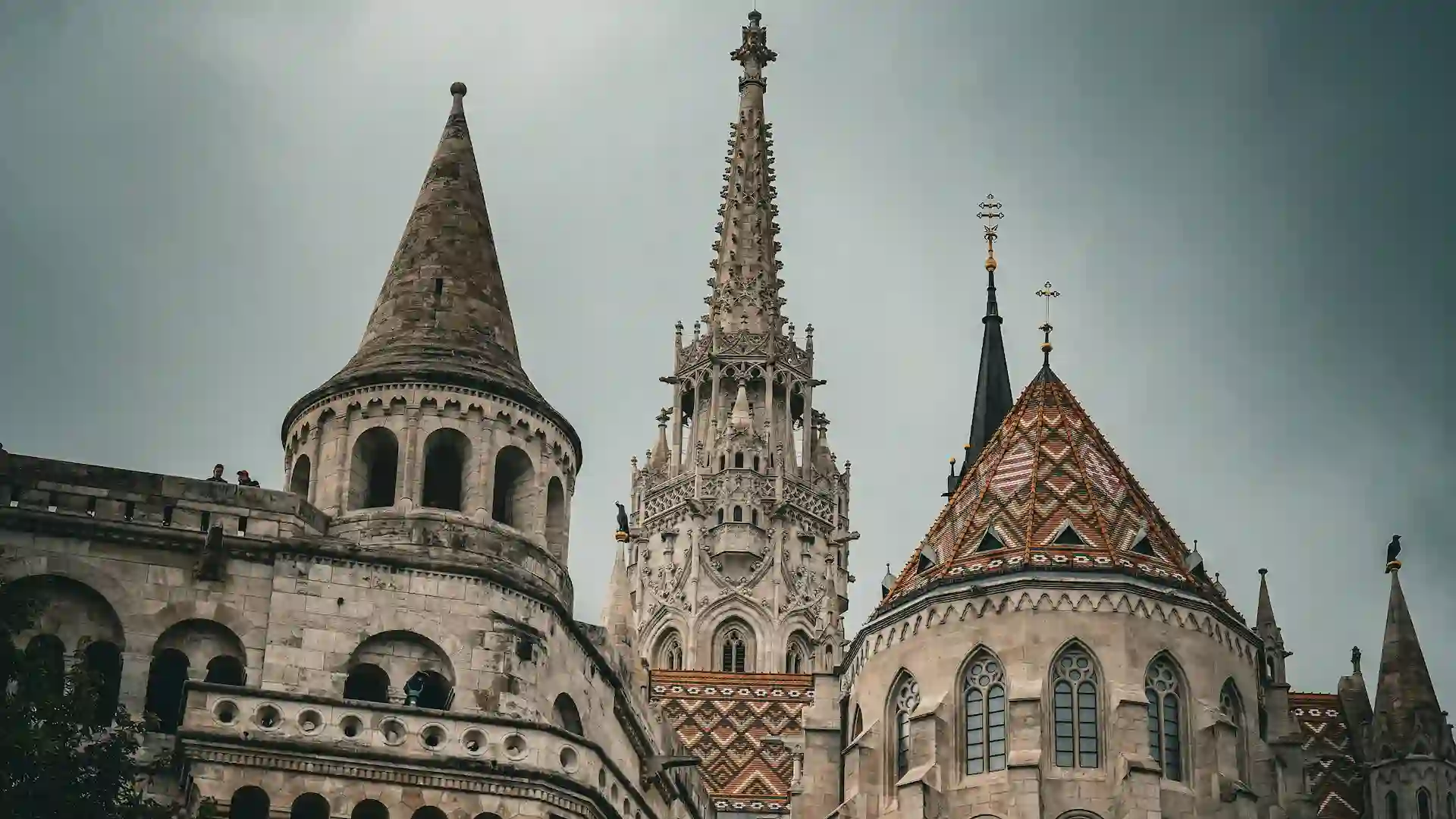 Visit this iconic church with its colorful tiled roof and historic interior.