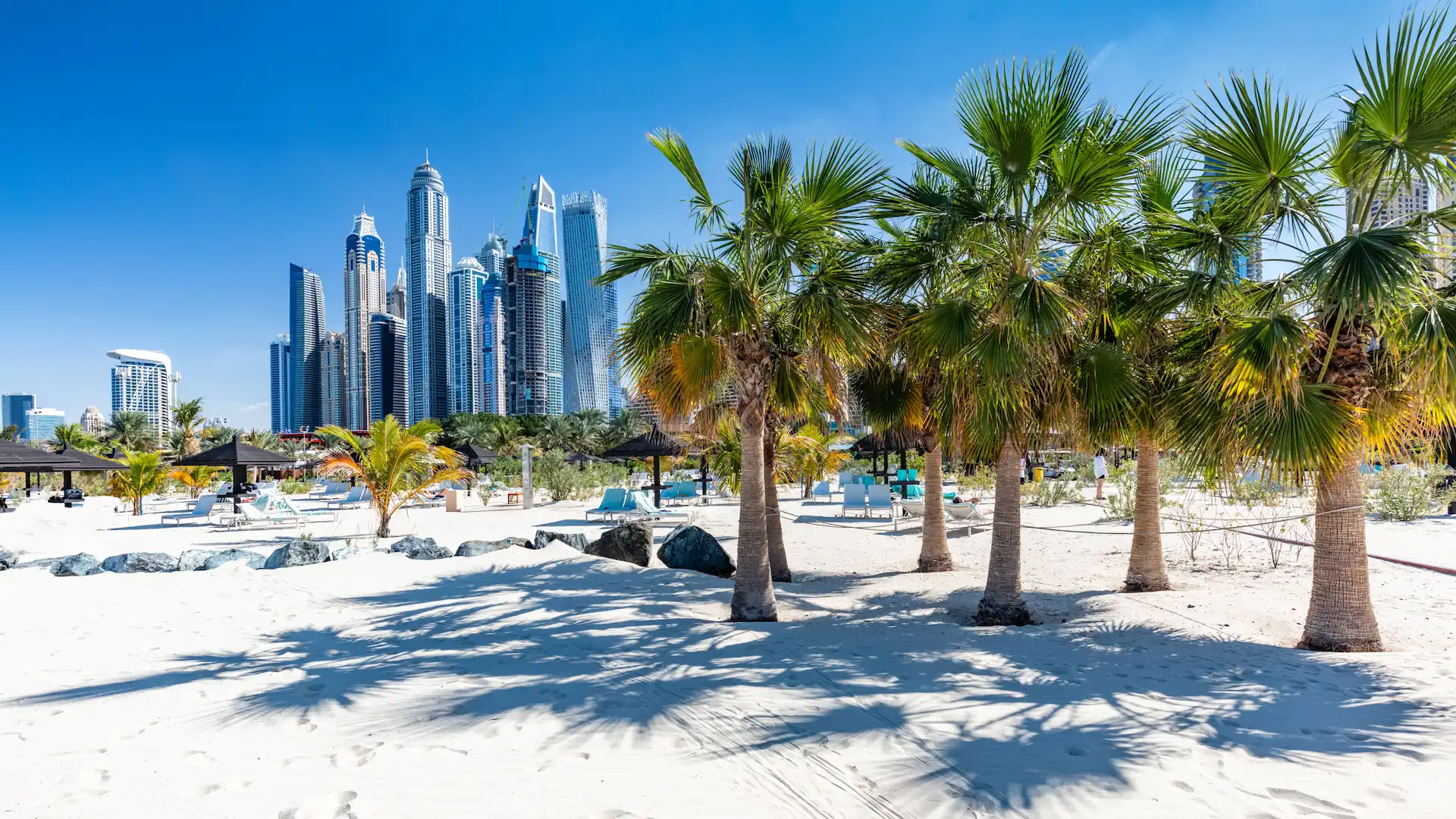 Jumeirah Beach is one of Dubai's most popular public beaches, known for its golden sands and stunning views of the iconic Burj Al Arab. The beach is family-friendly and features amenities like showers, changing rooms, and restaurants. It’s a great spot for sunbathing, swimming, and enjoying the Dubai coastline.