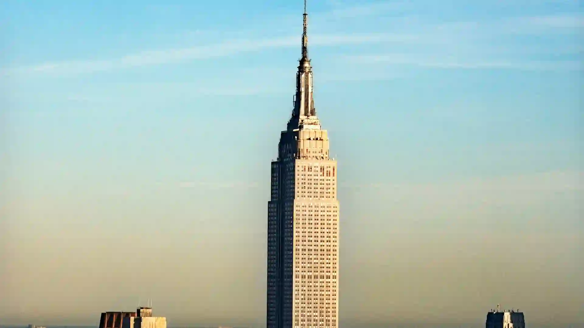 The Empire State Building is one of the most famous skyscrapers in the world, offering panoramic views of New York City from its observation decks on the 86th and 102nd floors.