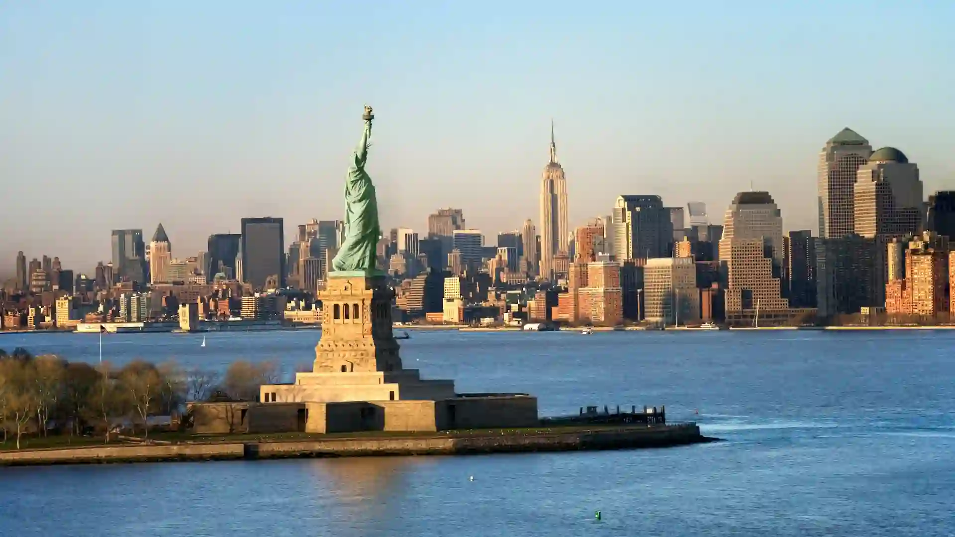 The Statue of Liberty, a gift from France, stands tall on Liberty Island and is a symbol of freedom and democracy. Visitors can take a ferry to the island and explore the statue's base or even climb to the crown for breathtaking views of New York Harbor.