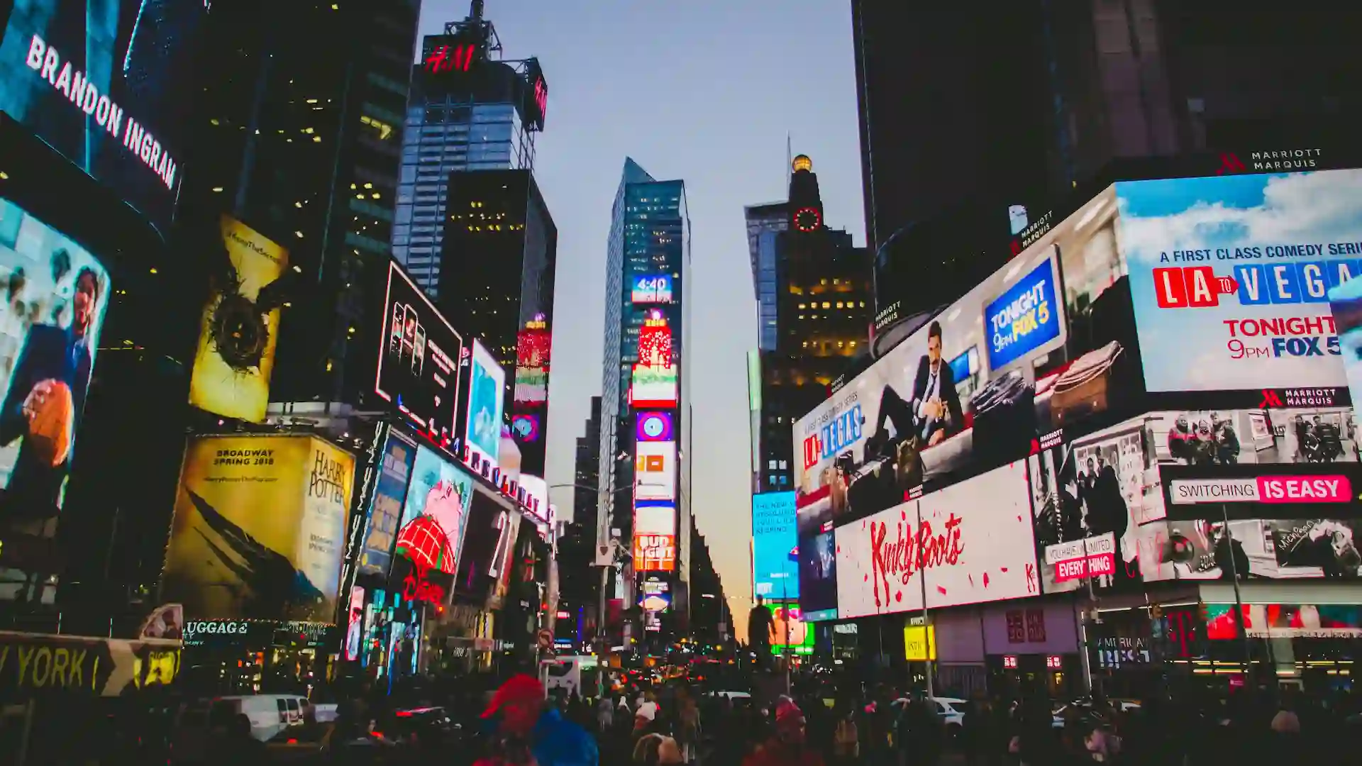 Times Square is known for its bright neon lights, Broadway theaters, and bustling atmosphere. It's a must-visit destination for shopping, dining, and experiencing the vibrant energy of New York City.