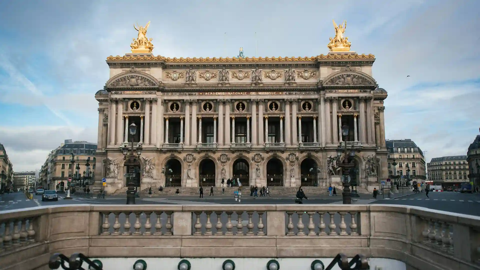 The Opéra Garnier is a masterpiece of 19th-century architecture, designed by Charles Garnier. Known for its grand staircase, lavish interiors, and crystal chandeliers, it inspired Gaston Leroux’s *Phantom of the Opera*. Visitors can tour its magnificent halls or attend performances. The opera house remains a symbol of Parisian cultural heritage.